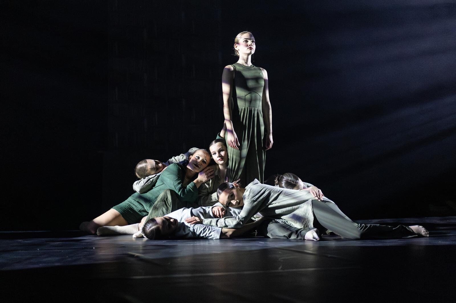 Contemporary group piece, dancers forming a pyramid